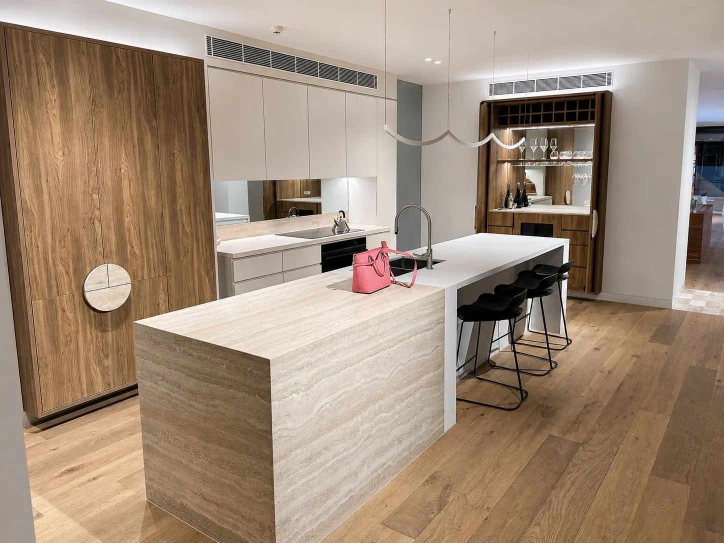Rozelle Village Display Suite kitchen with stone island and custom timber cabinetry