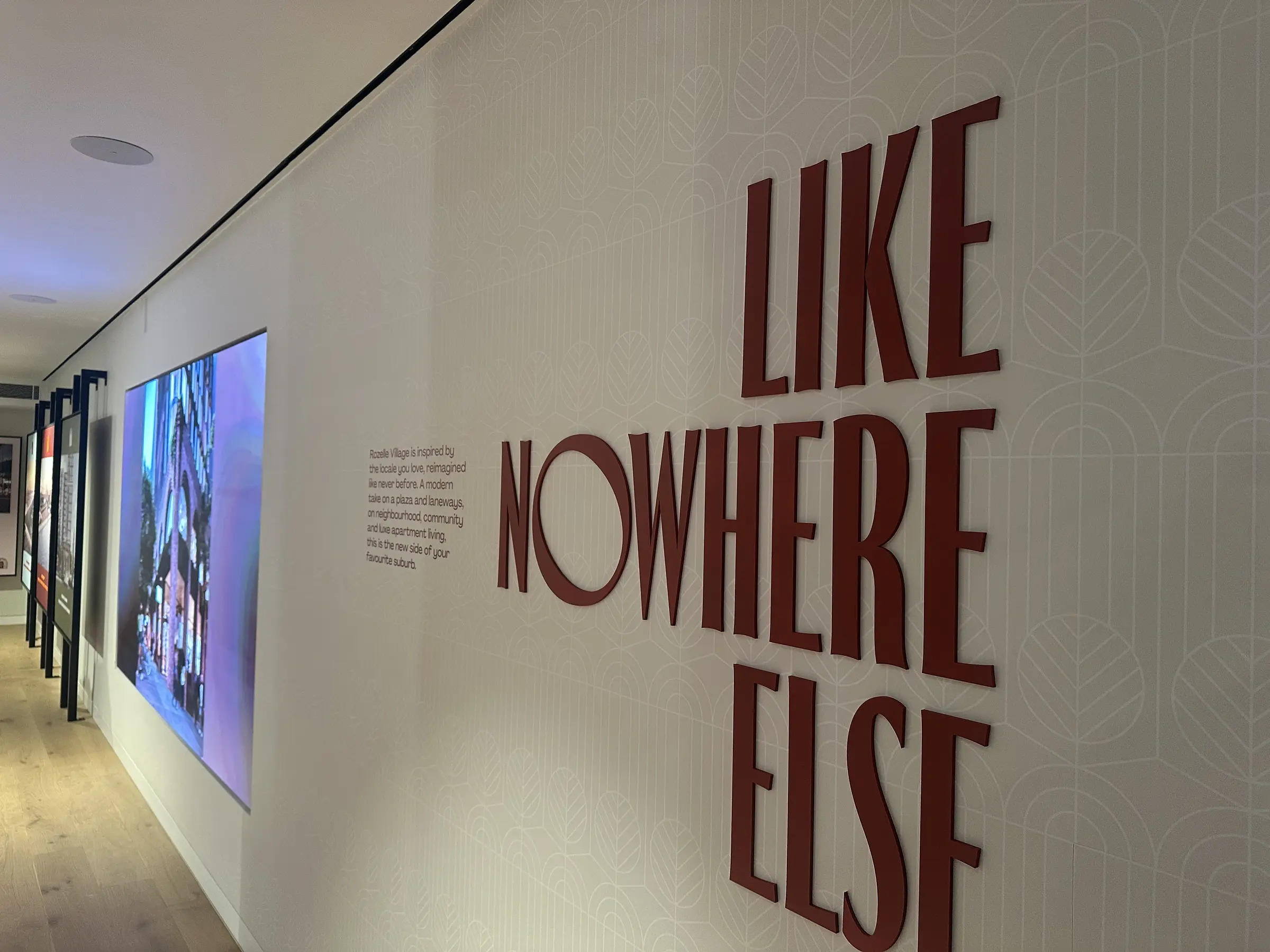 Branded presentation wall in the Rozelle Village sales suite