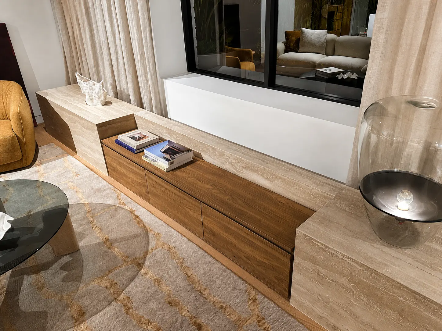 Integrated timber and stone living room cabinetry